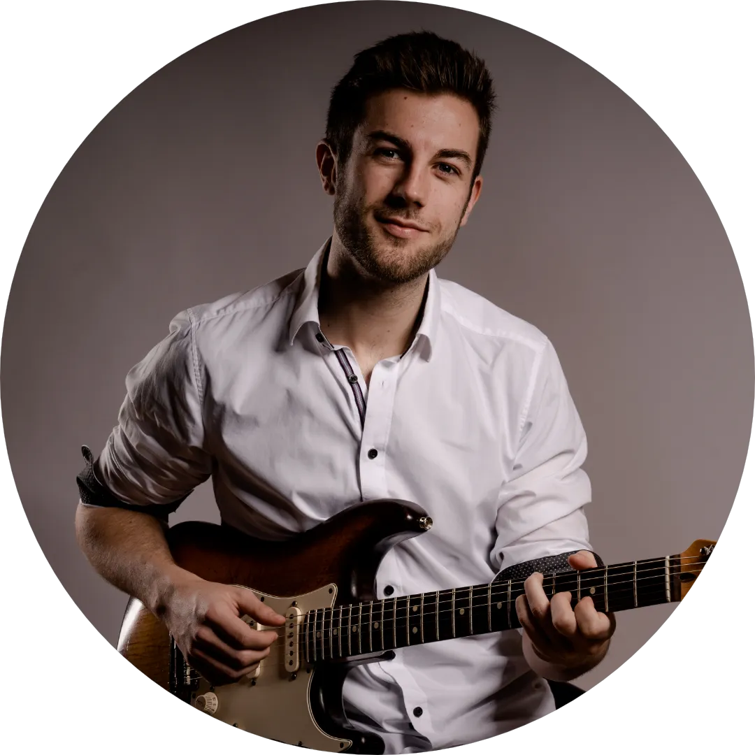 Porträt von Jan mit E-Gitarre